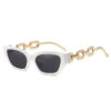 White frame cat eye sunglasses for women with black uv400 lenses and gold metal chain link temples